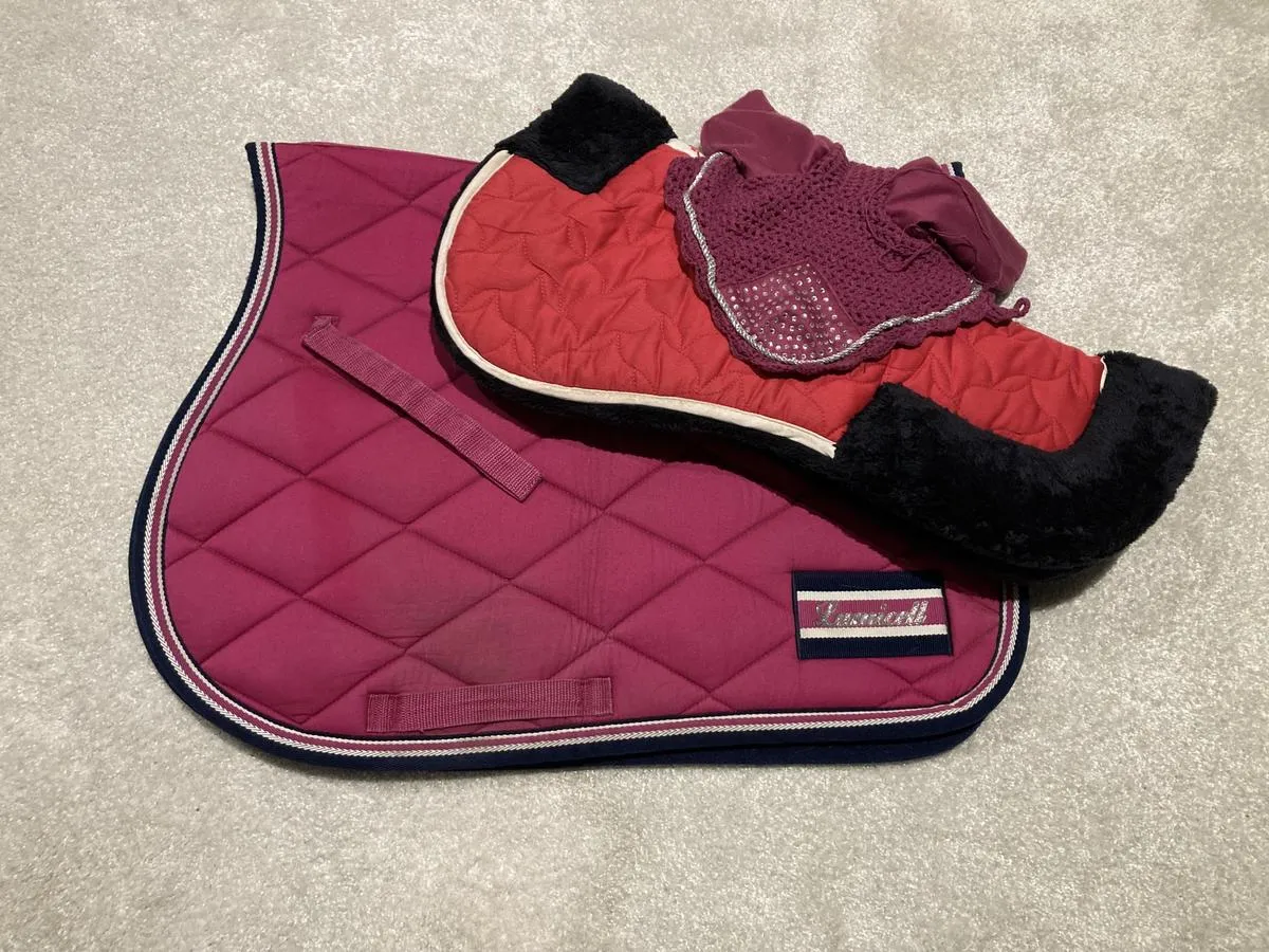 Pink LAMICELL saddle pad set with matching FOUGANZA bonnet and saddle pad.