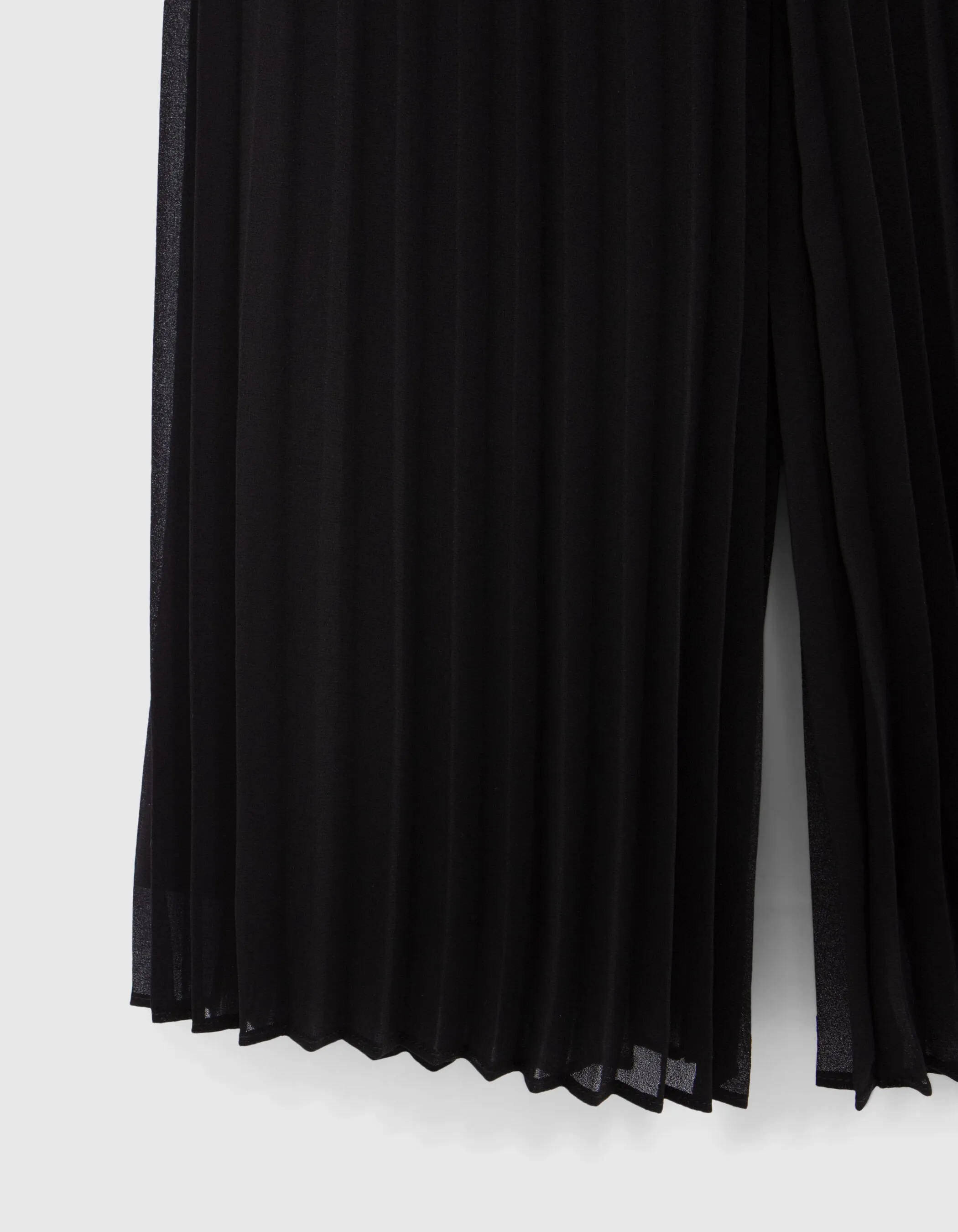 Wide black pleated girls' pants.